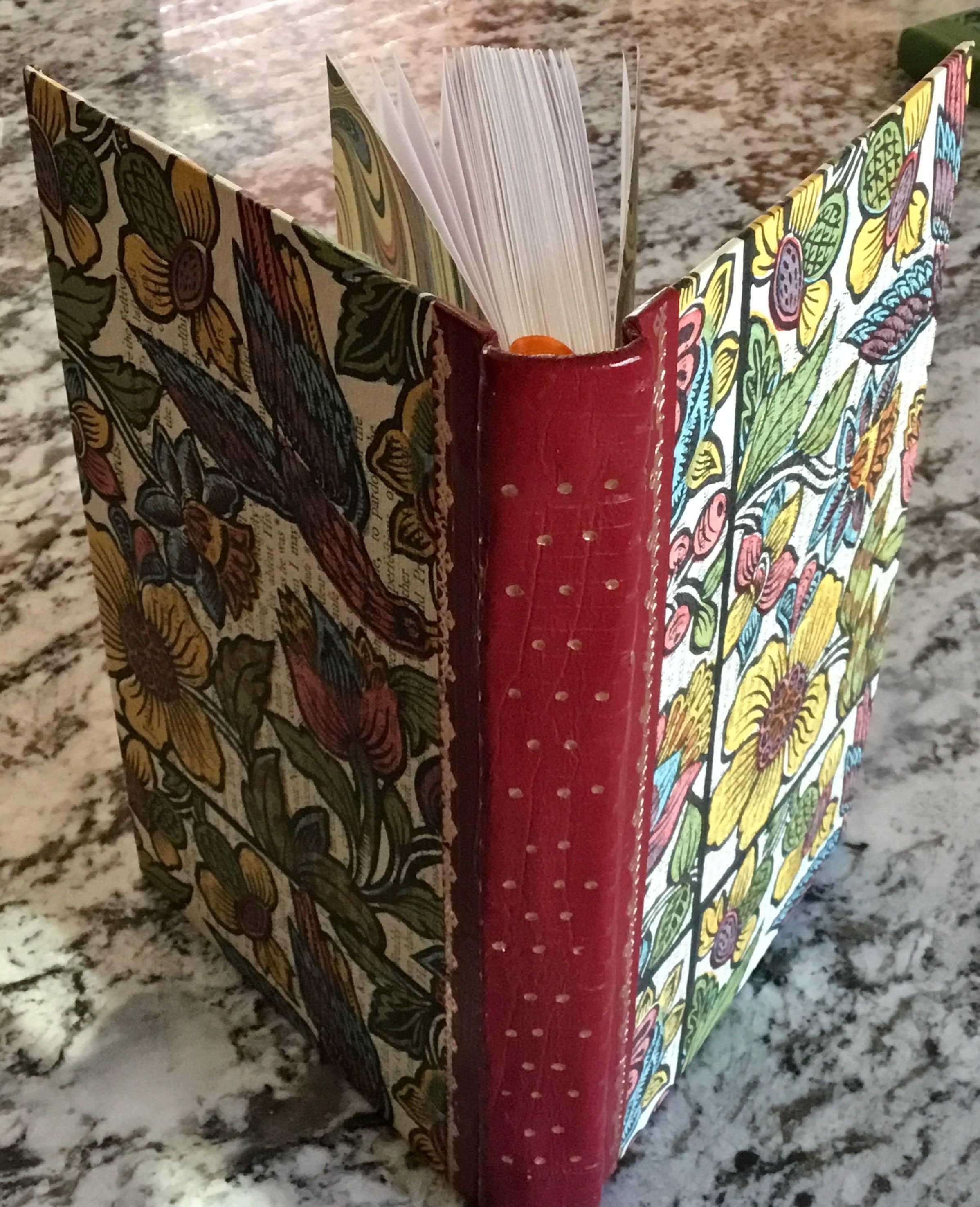 One of a kind marbled parchment sheets bound to two sizes (4x6 or 8.5x11 inches) of Reflections Sketchbooks with logo pen.  Will cover sketchbook of your choice